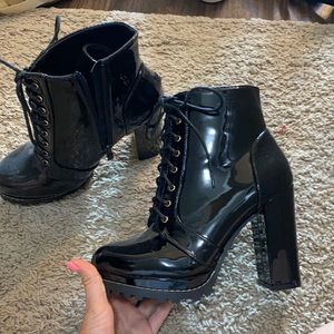 Never worn shiny leather heeled boots
